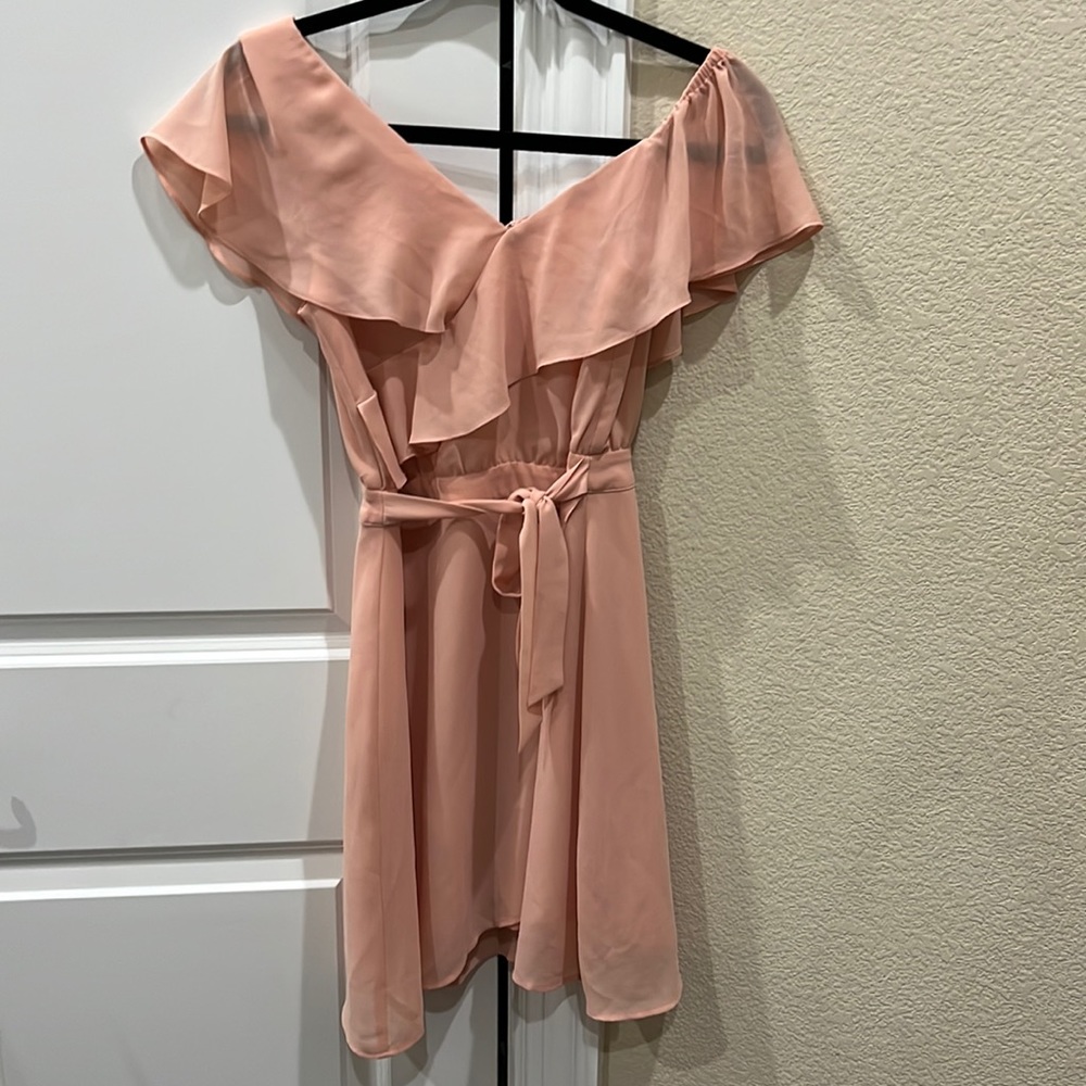 I am selling a peach summer dress